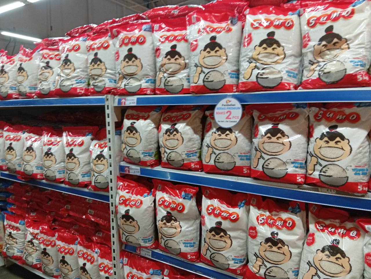 Shelves of Sumo-branded rice in 5 kg bags at GrandLucky SCBD